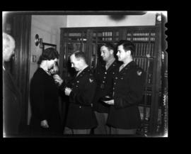 Howard, Mrs. J. (receiving medal)