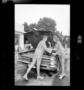 Granny's Gas Station, Girls Pumping Gas